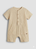Giggles : Textured jumpsuit with short sleeves and a pocket